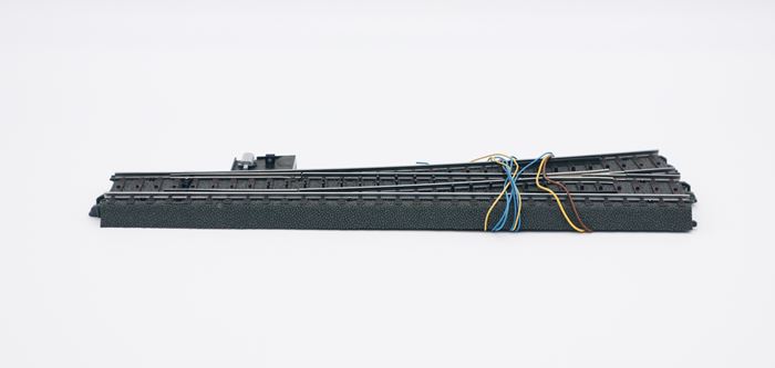 Märklin 24711 sporskifte, venstre, elektrisk med lys
